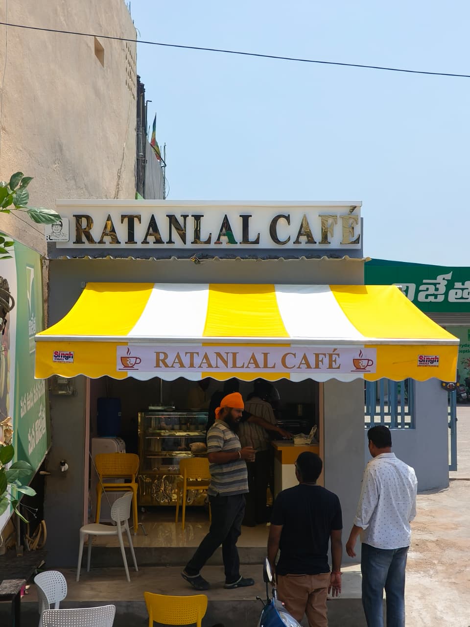 Ratanlal Café — branded awning